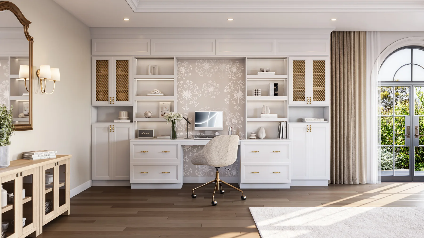 Custom white home office built-ins with bookcases, glass-front cabinets and a centered desk